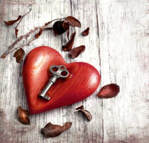 Herzm mit Schlüssel und Rosen